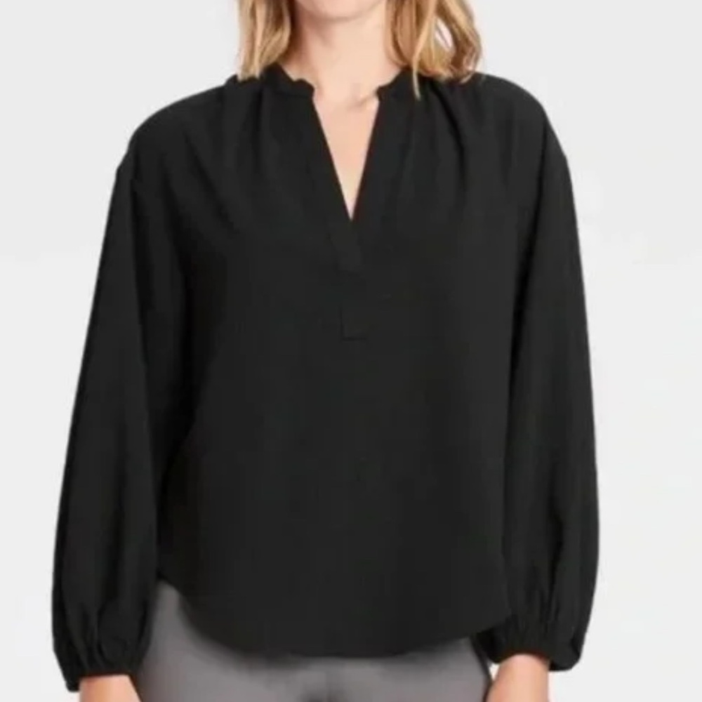 A new day. Long sleeve, balloon sleeve blouse